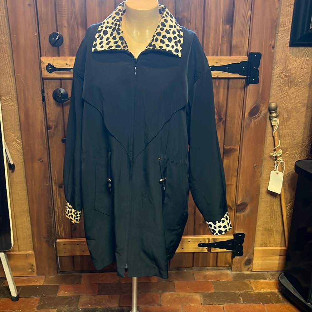 Parasilk lightweight soft woman’s coat Animal print trim.